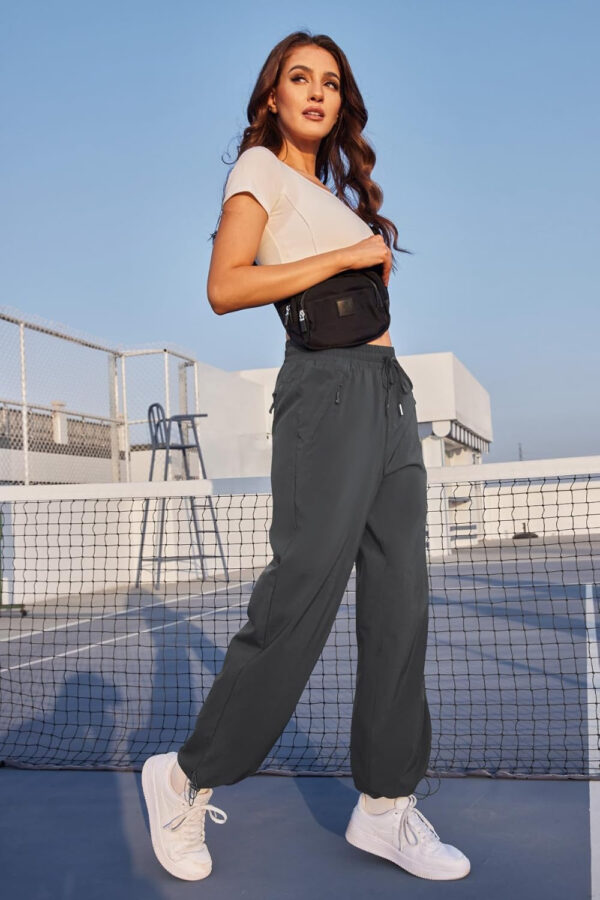 6899f580b73ffef836489eab2562f82a191fd4953e163fc605d80.jpg Womens Athletic Hiking Pants Lightweight Quick Dry Water Resistant Elastic Waist Cargo Pants with Zipper Pockets